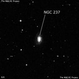 NGC 237 - спиральная галактика с баром. Описание NGC 237:, Галактика в созвездии Кит