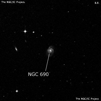 NGC 690 - спиральная галактика с баром. Описание NGC 690:, Галактика в созвездии Кит